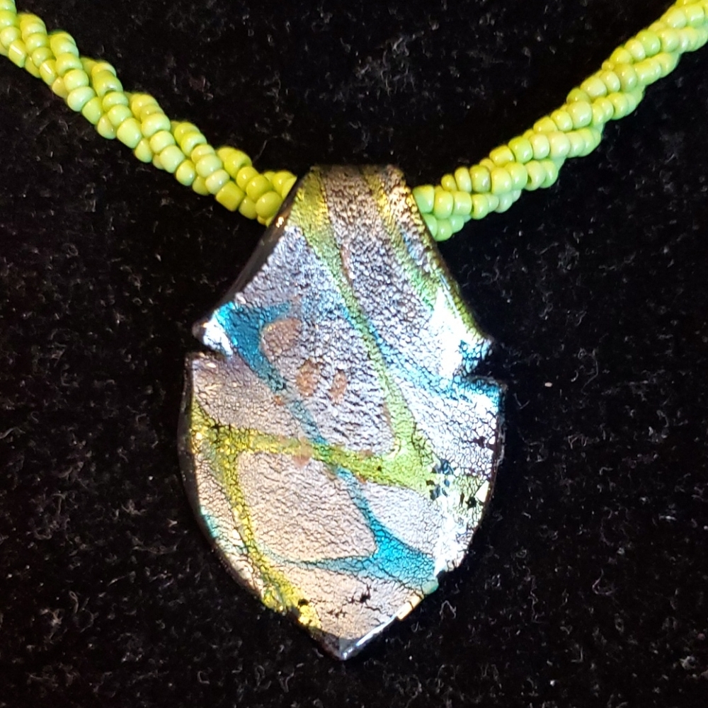 Lime green beaded necklace with resin "arrowhead"